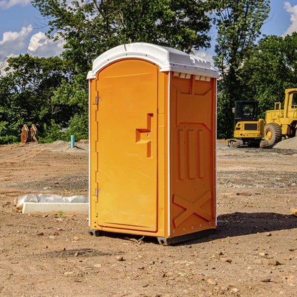 how often are the portable restrooms cleaned and serviced during a rental period in Evansville Wyoming